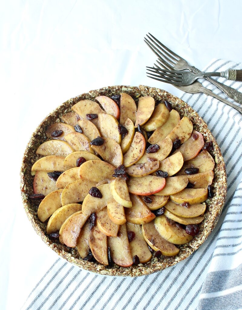 Gluten-free, no-bake apple pie, wrapped in a nutritious seed crust. Vegan, Nut-free, Paleo