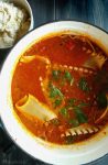Vegan & GF Lasagna Soup, loaded with veggies, topped with spinach and fresh tofu ricotta.