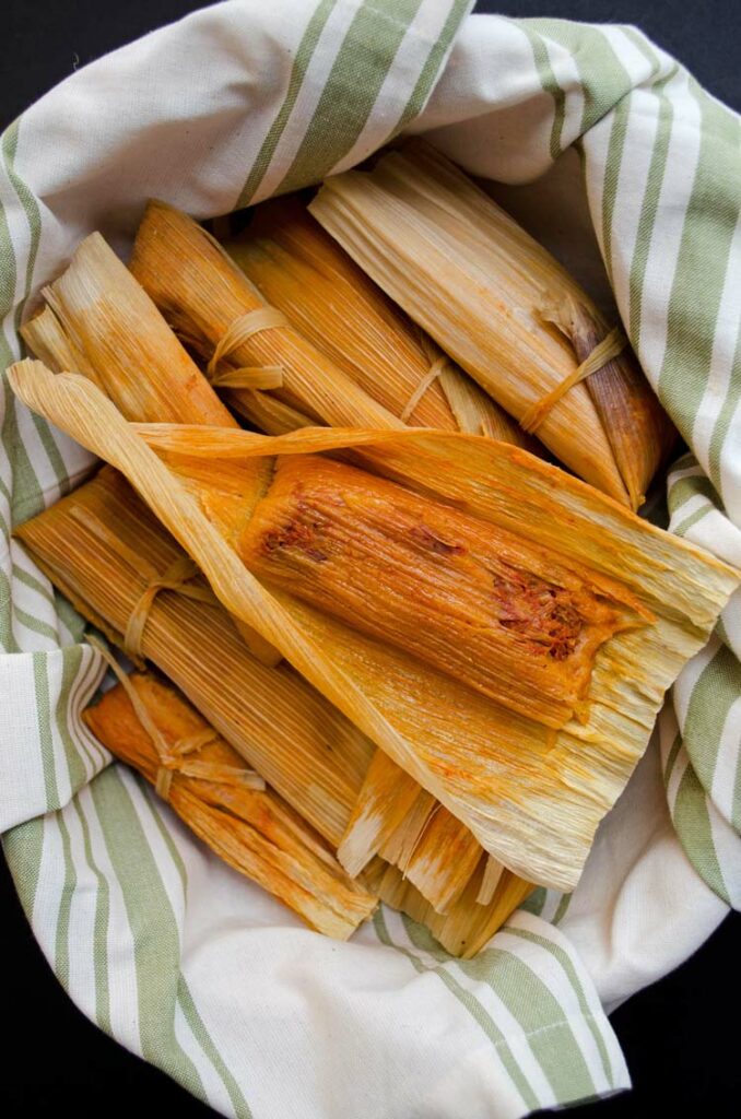 Delicious jackfruit tamales with a bit of heat from Red Chile flavored masa. Delicious & GF.