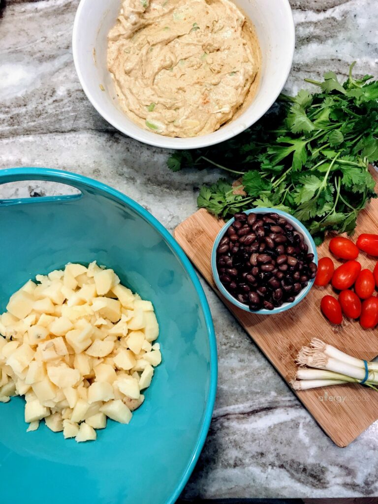 This vegan Mexican Potato Salad is loaded with buttery avocado cream, black beans and tons of zesty flavor for a south-of-the-border take on a classic Summer recipe. 