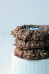 You're going to love these chewy, coconut & chocolate cookies made from a few simple ingredients. Not too sweet but perfect for dessert or breakfast.