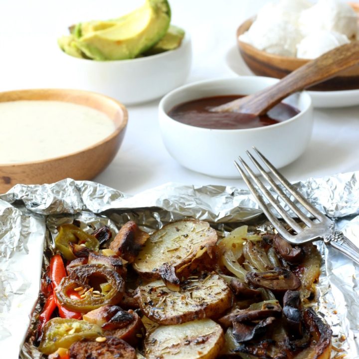 Potato & Veggie Foil Pack Dinner is easy & delicious, seasoned with herbs and grilled to perfection .