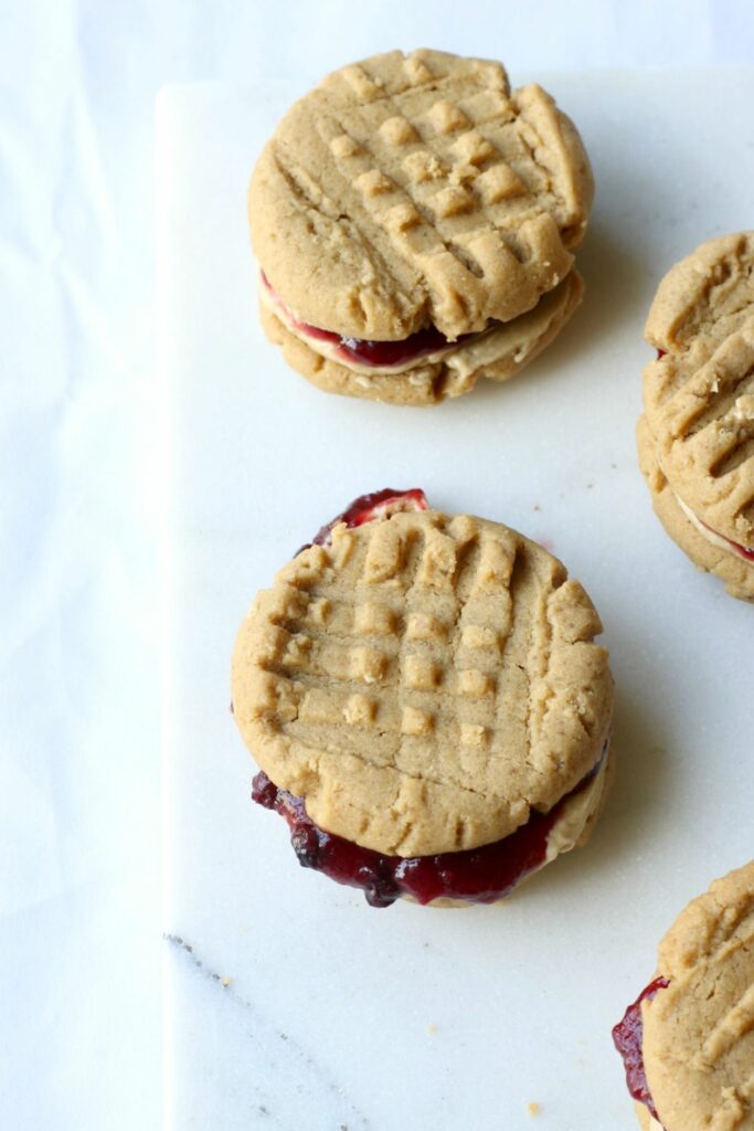 These are the best allergy-friendly, SunButter and jelly sandwich cookies you will ever make. Vegan with GF option