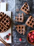 These Double Chocolate Waffles are not only easy to make, but also rich in chocolate-y goodness. All you need are a few allergy-friendly ingredients and they turn out light, fluffy & scrumptious! Truly one of our favorite Vegan & gluten-free waffle recipes! #glutenfree #vegan #allergyfriendly #dairyfree #chocolate #waffles