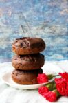 yummy chocolate donuts on serving plate